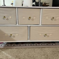 white and beige dresser with 5 fabric drawers
