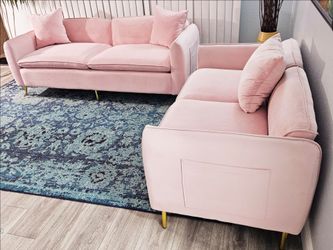 Like new!! 10 out of 10, pink velvet sofas, uniform color, side pockets for magazines, remotes, tablets, cell phones, etc... only used for stage produ