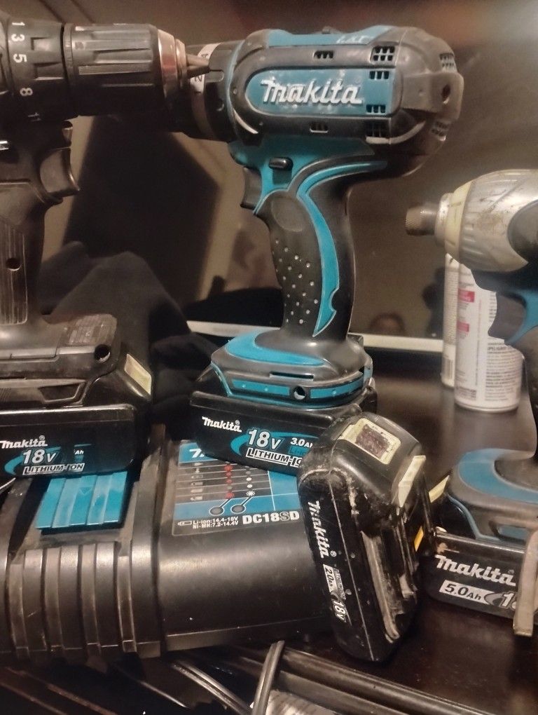 Makita 2 Impacts , 1 Hanmer Drill 2 3ah , 1 5ah And 1 2ah Batterys