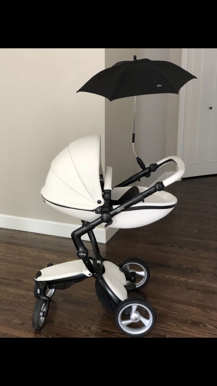 Mima Xari stroller with maxi cosi car seat