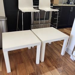 Bar Stool And Small White Tables