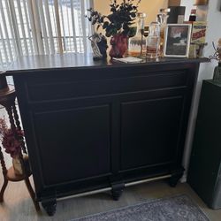 Black Hard Wood Bar Cabinet with Brass Footrail and Wine Bottle and Glass Storage