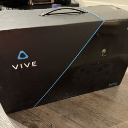 HTC Vive VR Headset, Controller, Base station. 