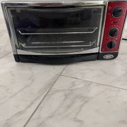 Oster 6295 6-Slice Convection Toaster Oven, Red