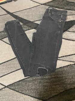 Black Skinny Jeans with Distressed Hem