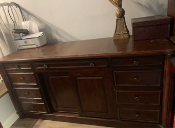 Elegant credenza with pull out desk