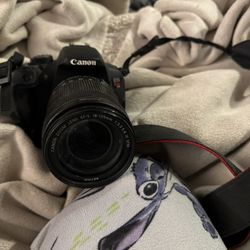 Canon Rebel T5i + Batteries And 18-135mm Lens