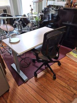 48×23 Sit&Stand desk with desktop power block includes USB port an also has a built-in underneath power strip with dual USB ports in fantastic conditi