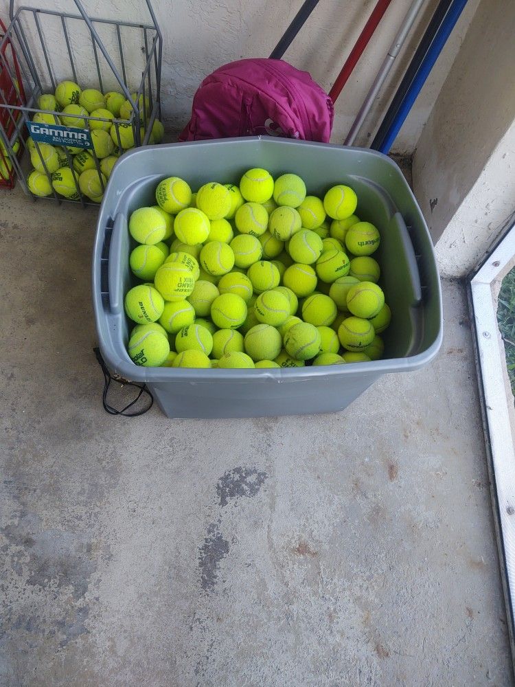 318 Tennis balls, 10 cents a ball  and three ball Hoppers