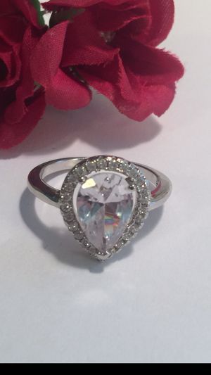 Photo AVAS tear drop shaped gorgeous White Sapphire with tiny pave set sapphires around on .925 sterling band size 8