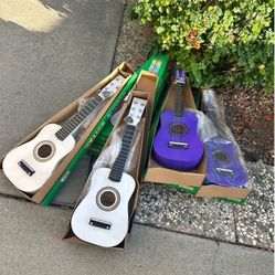 Gorgeous ❤️ acoustic guitar for kids 🧒 22 inch $25 each