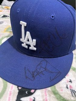 La cap signed  and lanyard