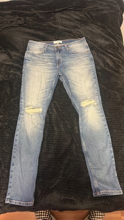 Light Wash Distressed Slim Jeans