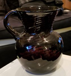 Colored glass deep Amethyst pitcher