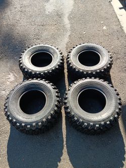 set of 4 golf cart tires or quad 4x4 size 22x11.00-10 with 98% tread