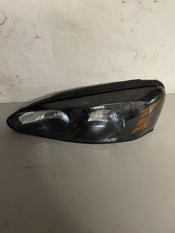 PONTIAC GRAND PRIX DRIVER HEADLIGHT ASSEMBLY