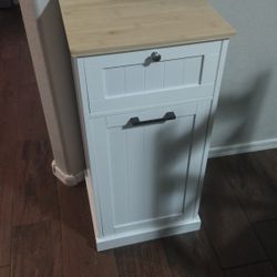 Trash Can Cabinet.