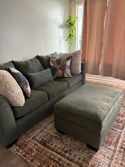Sleeper sofa with ottoman for sale