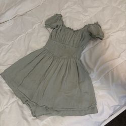 Women’s XS Green Hollister romper (skirt skirt over shorts) with polka dot pattern.