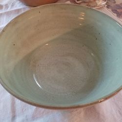 Green clay hand crafted pottery bowl
