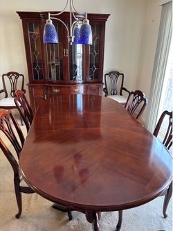Table and 6 chairs and 2 pc hutch