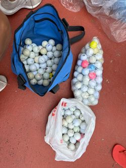 collection of assorted used Titleist, TaylorMade, Callaway, Bridgestone, and Pinnacle golf balls