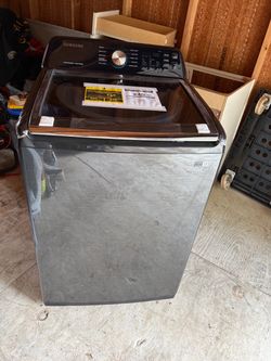 Brand new Samsung washer never used $400 OBO. Local pickup, you haul.
