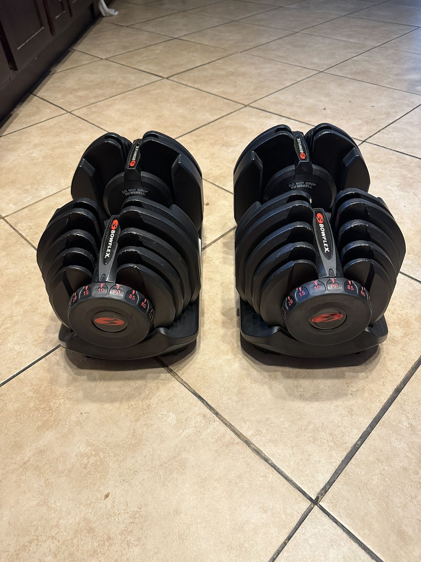 Bowflex adjustable weights 10-90lbs