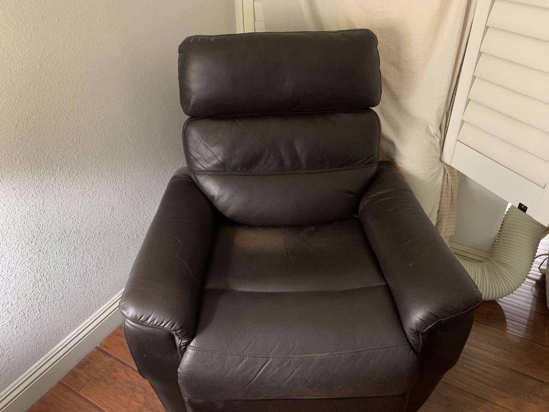 Brown Leather Electric Chair.  $50.   
