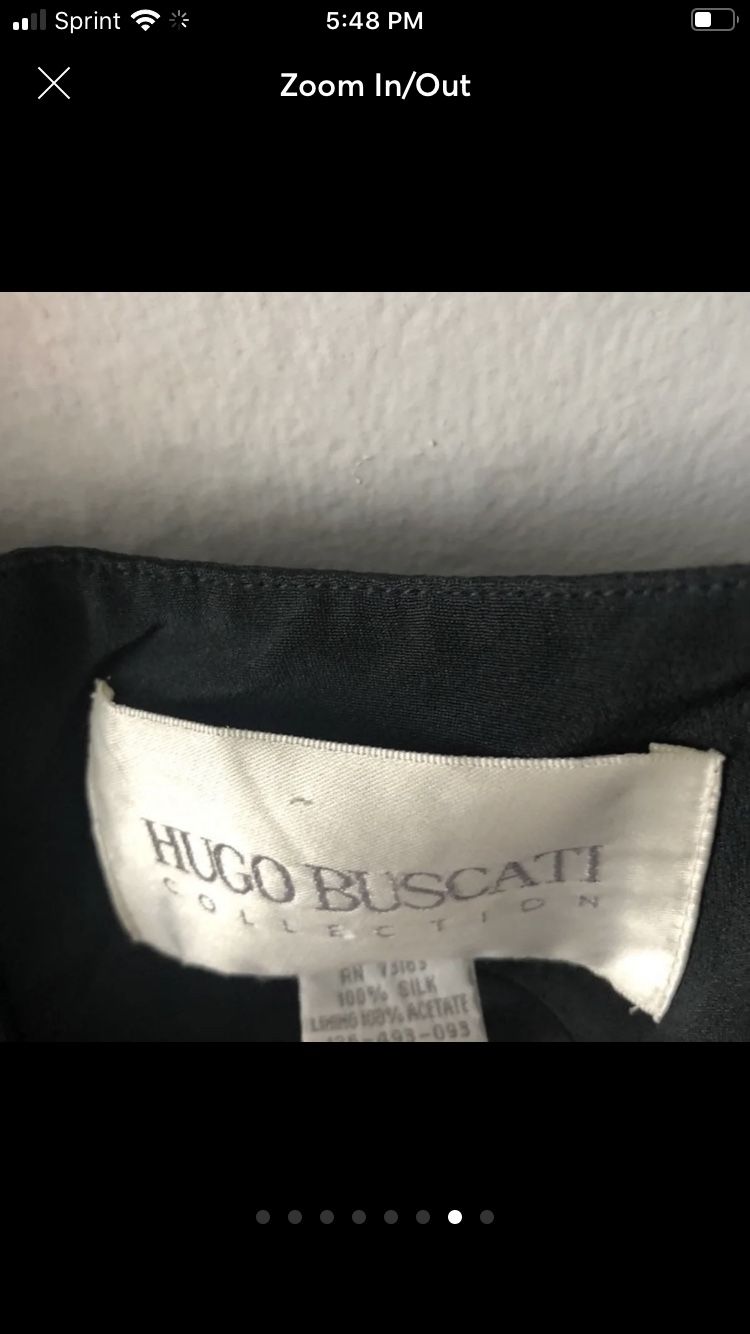 100% SILK Hugo Buscati little black dress loaded with Taylor designs including darts down the back and the front to enhance fitting, A hidden zipper
