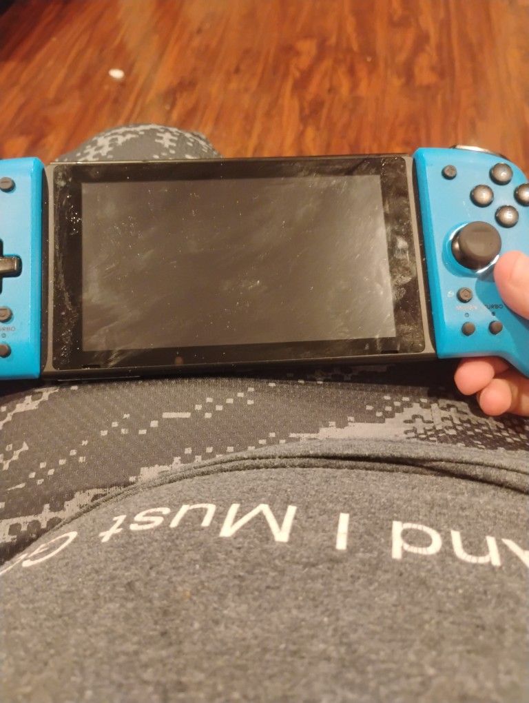 Fairly New Nintendo Switch With Custom Blue Grips