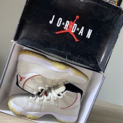 Jordan 11s  Retro Platinum Tint/University Red 