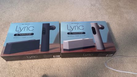 Lyric Therapeutic Massager two ( black and white ) brand new sealed