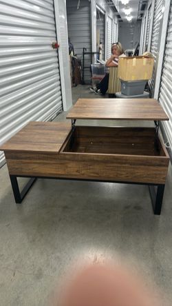 Coffee Table with slide opening and lift.