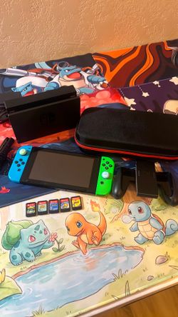 Nintendo Switch. Nintendo switch system. Complete with 5 games and case. Animal crossing, Mario, Sonic and more