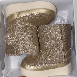 Gold baby UGGs 