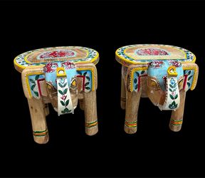 Hand carved wooden elephant stools
