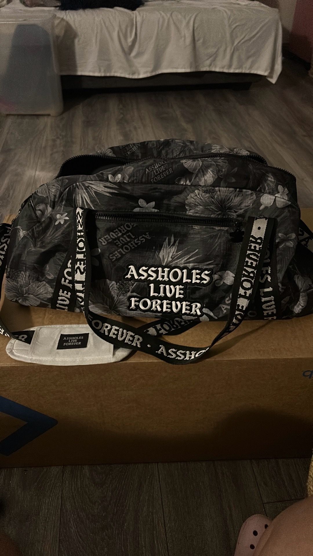 Assholes Live Forever duffle bag