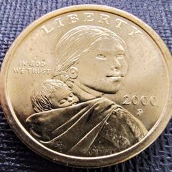 2000-P SACAGAWEA Gold Tone $1.00 Coin In Very Good Circulated Condition.
