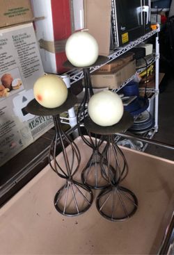 3metal candle holder.