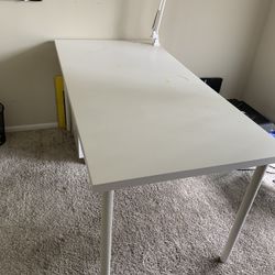 Sleek White IKEA Desk - Modern Design, Perfect for Any Workspace