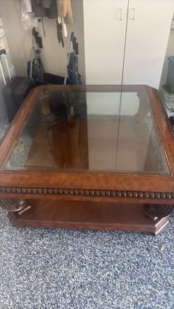 Oakwood and brass coffee table Oakwood and brass coffee table