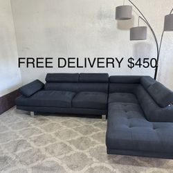 FREE DELIVERY - Modern Sectional with adjustable head and armrest.