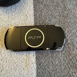 Sony PSP 3000 with games and memory cards
