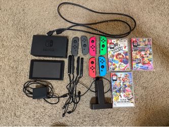 Nintendo switch with games and accessories