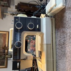 New Home Model L-372 Sewing Machine with case. Tested. It runs smoothly. What you see in the pictures is what you will have  