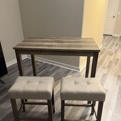 Table And Stools 