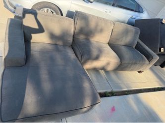 Grey couch with ottoman chaise