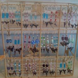 Handcrafted seashell and shark tooth jewelry wrapped in sterling silver wire.