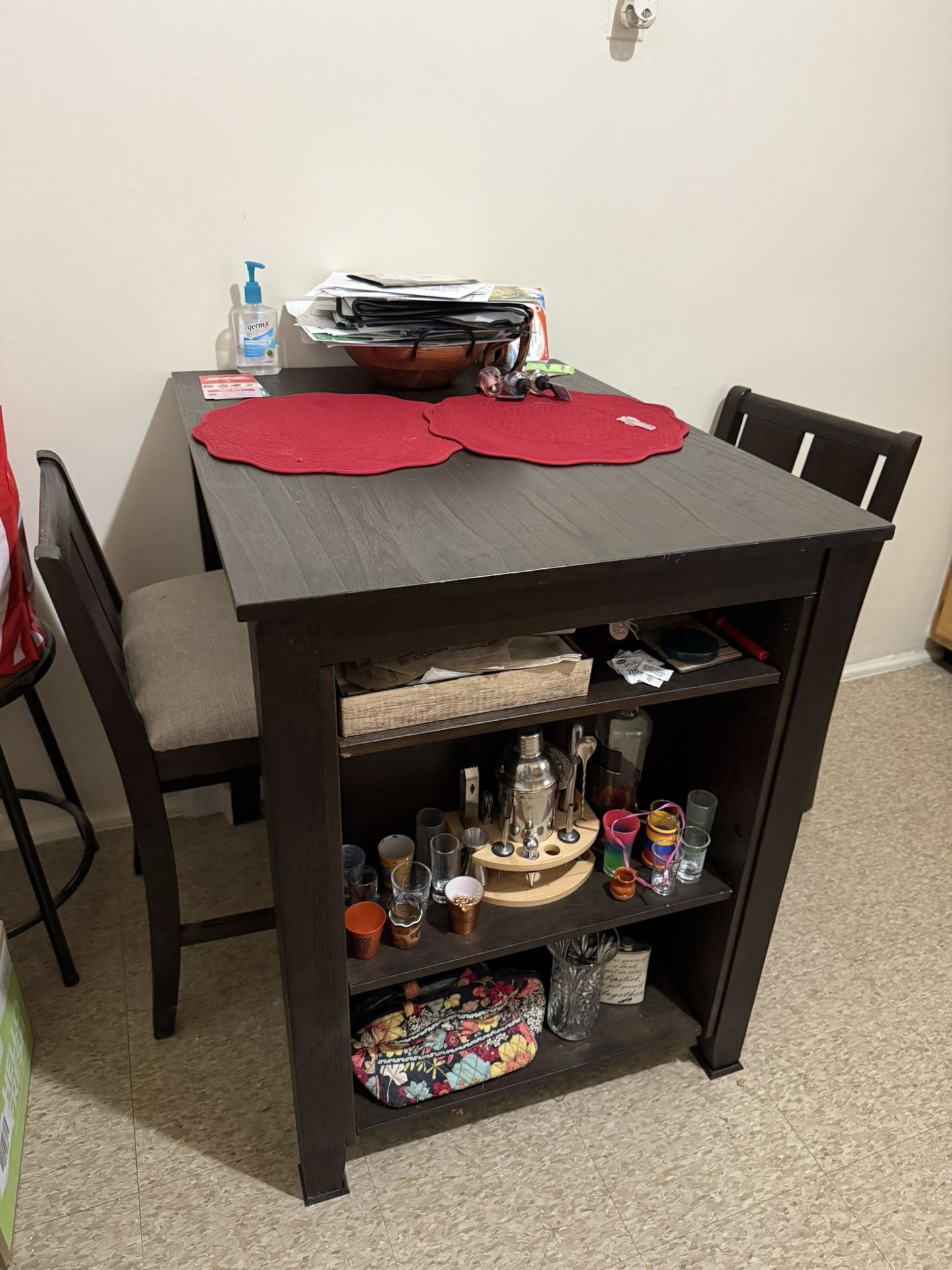 brown bar table and chairs
